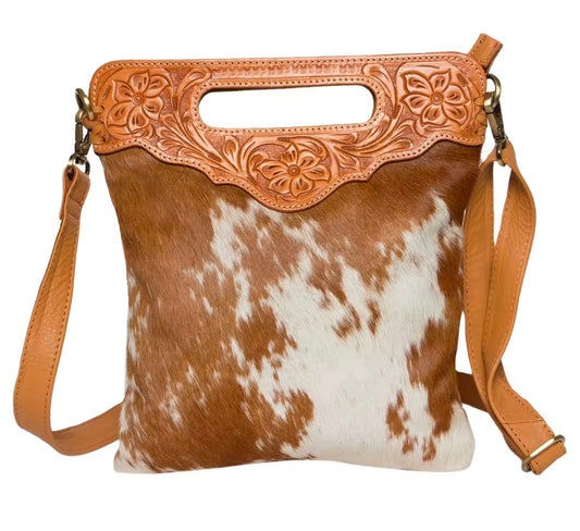 Tan & white hair on hide crossbody bag with hand tooled leather.